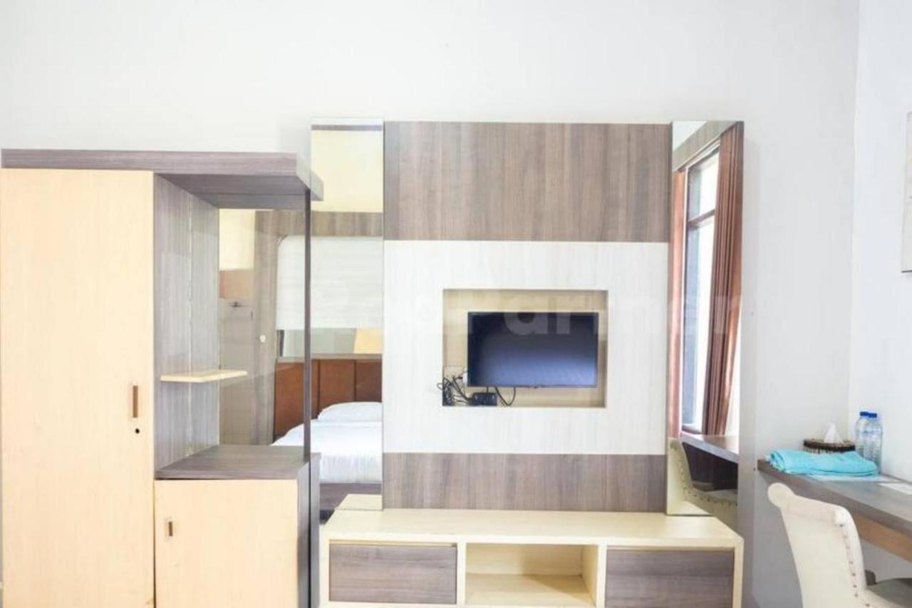My Hommy Homestay Mitra Reddoorz Surabaya Exterior photo